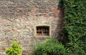 window on stone facade