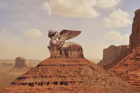 statue in the desert as a fantasy