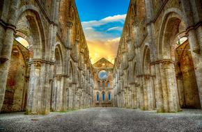 picturesque Ruin of aged abbey at colorful sky