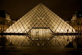 night illumination of the famous Louvre Museum in Paris