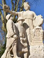 Beautiful Monument Ambois, near the trees, in France, under the blue sky