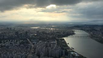 Beautiful cityscape of Seoul, under colorful, cloudy sky, in Republic of Korea
