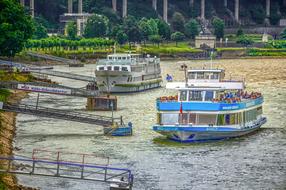 Geyser ship on the colorful and beautiful river, among the plants in Andernach, Germany