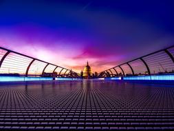 distant view of st paul's cathedral in london at colorful twilight