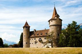 Beautiful Medieval castle, among the colorful plants in Igis, Switzerland