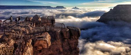 people on the observation deck at the Grand Canyon in Arizona