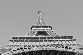 monochrome photo of the Eiffel tower view from below