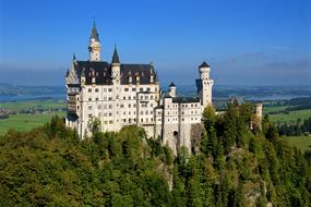 panoramic view of the Neuschwanstein castle on a sunny day