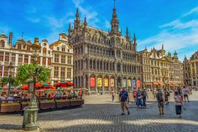 people resting on Grand Place, Belgium, Brussels