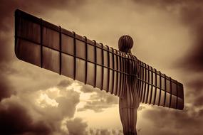 clouds over modern sculpture angel of the north