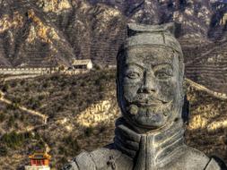 sculpture of a warrior on the background of a rock in china