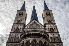 medieval roman catholic church, Minster of St. Martin's, at clouds, germany, bonn