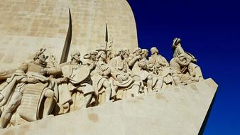 monument to the discoverers, detail at sky, portugal, lisbon