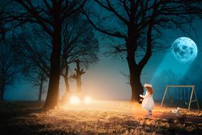 Girl on the night landscape near the car and trees