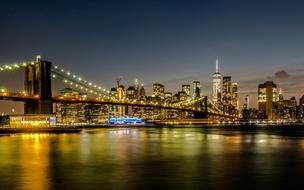 Brooklyn Bridge on the cityscape with the lights