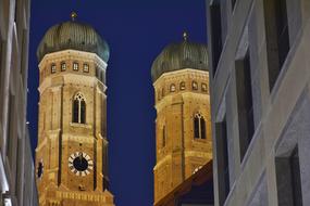 Beautiful towers of Frauenkirche, at blue sky on background, in Munich, Bavaria, Germany