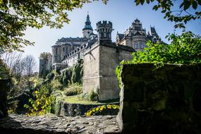 castle with towers on a background of blue sky