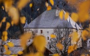 medieval castle in Budapest, Hungary and colorful autumn leaves