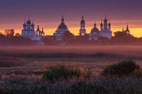 distant view of the Rostov monastery at dusk