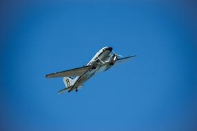 American aircraft douglas dc-3 in the blue sky