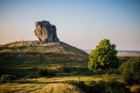 inselberg called the Devil's Rock on hill, Ukraine, Pidkamin
