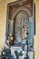 mourning women, aged marble sculpture at grave