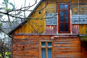 old wooden house with rectangular windows