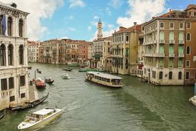 boat with tourists on the canal in venice