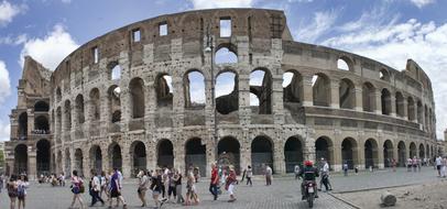 tourists in front of the architecture of ancient italy