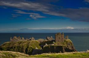 ruins of a castle on an island in Scotland