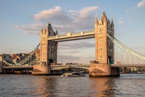 ship beneath Tower Bridge at evening, uk, England, London