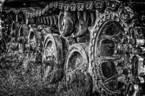 old chains of a tracked vehicle in black and white background