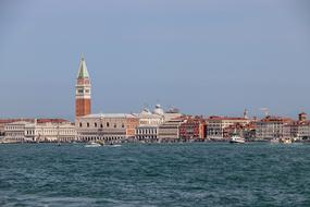 Beautiful landscape of the colorful Venice, among the blue water in Italy