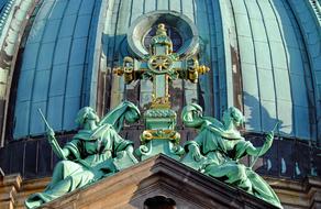 sculptures near the domed cross on Berlin Cathedral