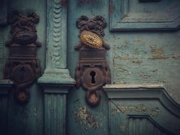 old handle on the wooden door