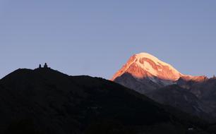 top of the Kazbek mountain in the sunlight