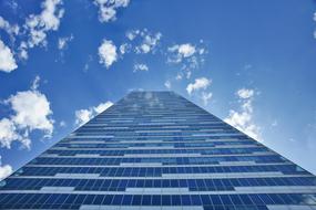 photo of a glass skyscraper in the city center