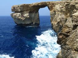 stone arch by the sea in Malta