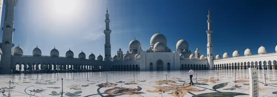 temple with a tower and a mosque