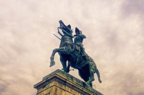 medieval knight, equestrian sculpture at sky