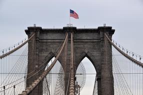 american flag at top of Brooklyn Bridge, usa, New York city