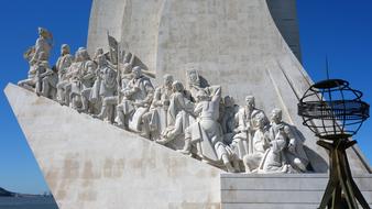 monument of the discoveries, human sculptures and steel globe, portugal, lisbon