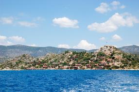 view from the water on the coast of turkey on a sunny day