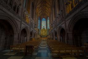 historical interior of Liverpool Cathedral at dusk, uk, england