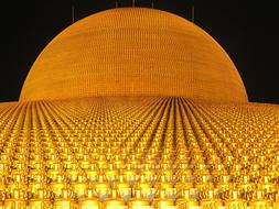 Beautiful Dhammakaya Pagoda with more thebn million gold Buddhas in Thailand