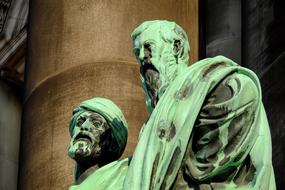 Green sculptures of the Matthew and Marcus, in the Berlin Cathedral in Berlin, Germany