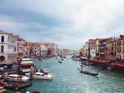 boats and gondolas on the canal in venice