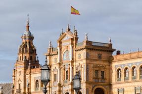 state flag on roof on Plaza Espana, spain, seville