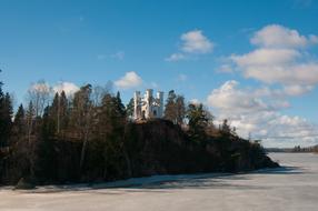 mausoleum on rocky coast at winter, russia, vyborg, mon repos park