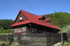 house on a hill near the forest in slovakia